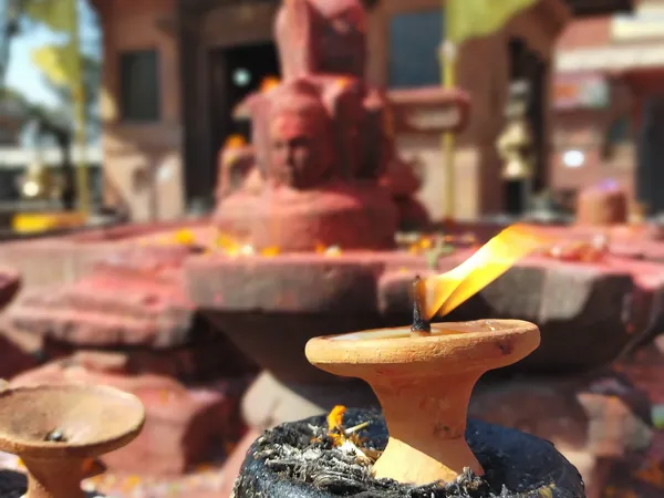 Butter lamp at a temple in the north of the valley